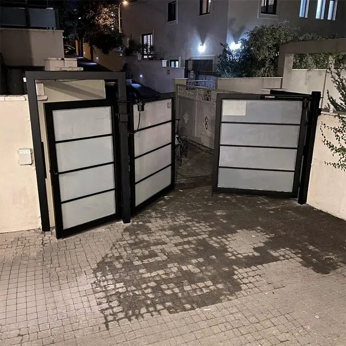 Driveway gate after refinishing in black